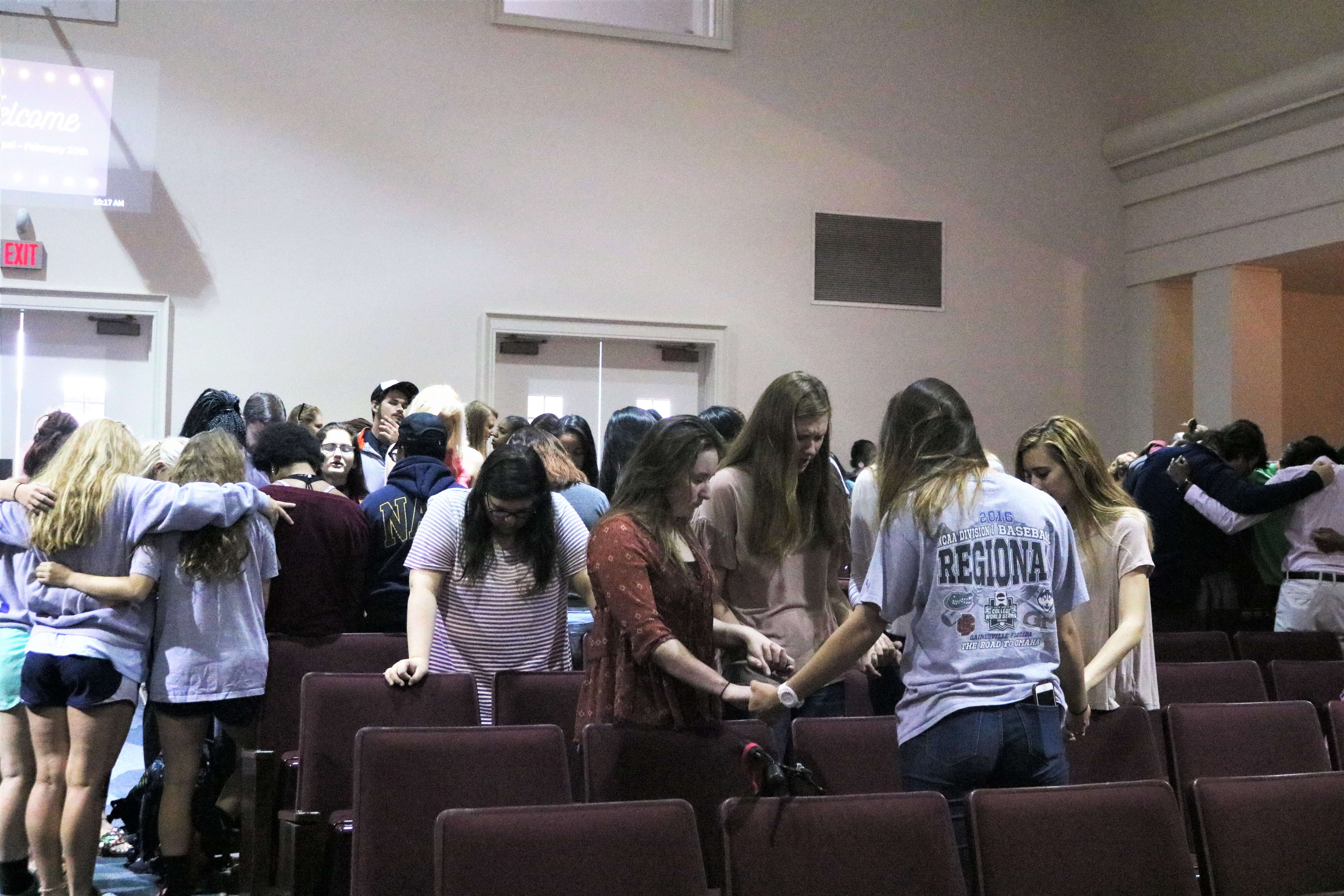 Students form prayer groups during Brewton-Parker College’s February 20 chapel service. Photo Credit: Jose Carrillo-Garcia
